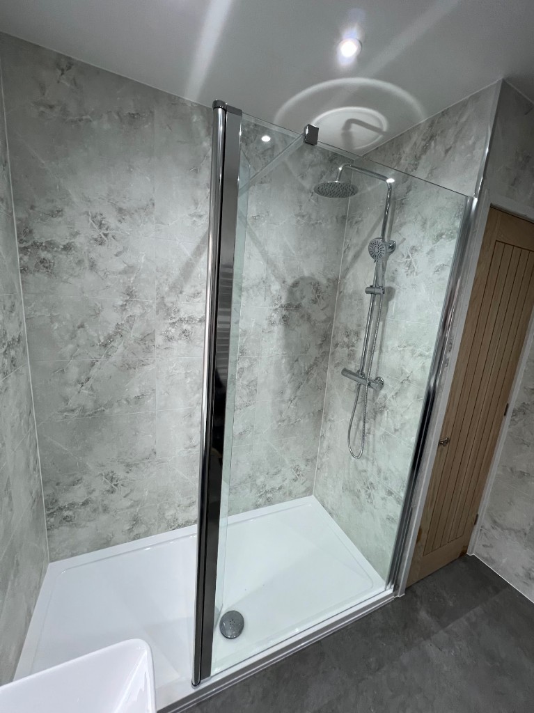 Bath-to-shower conversion in Hendon, Sunderland — walk-in shower with rainfall head