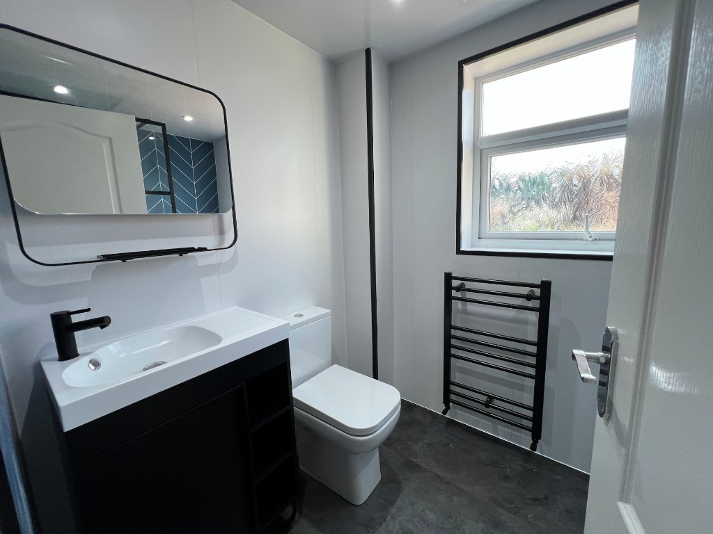 Bathroom renovation in Houghton-le-Spring, Sunderland — black and white ensuite